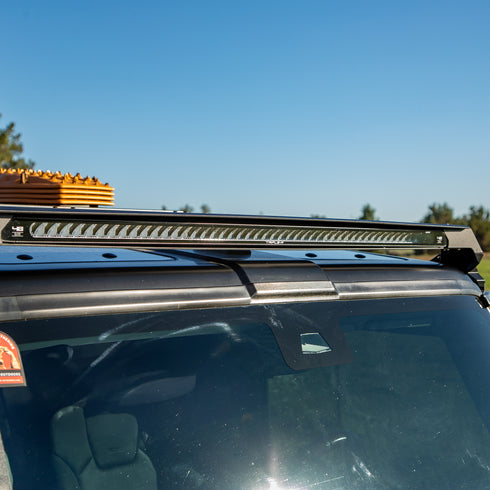 Slim LED lite bar on an Ineos Grenadier with light bar on a clear day