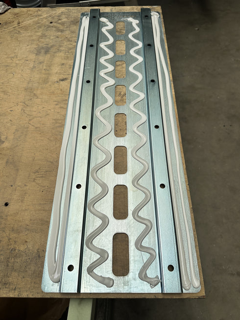 Heavy-duty aluminum Smartfloor single seat mounting plate and hardware for van seat installation.