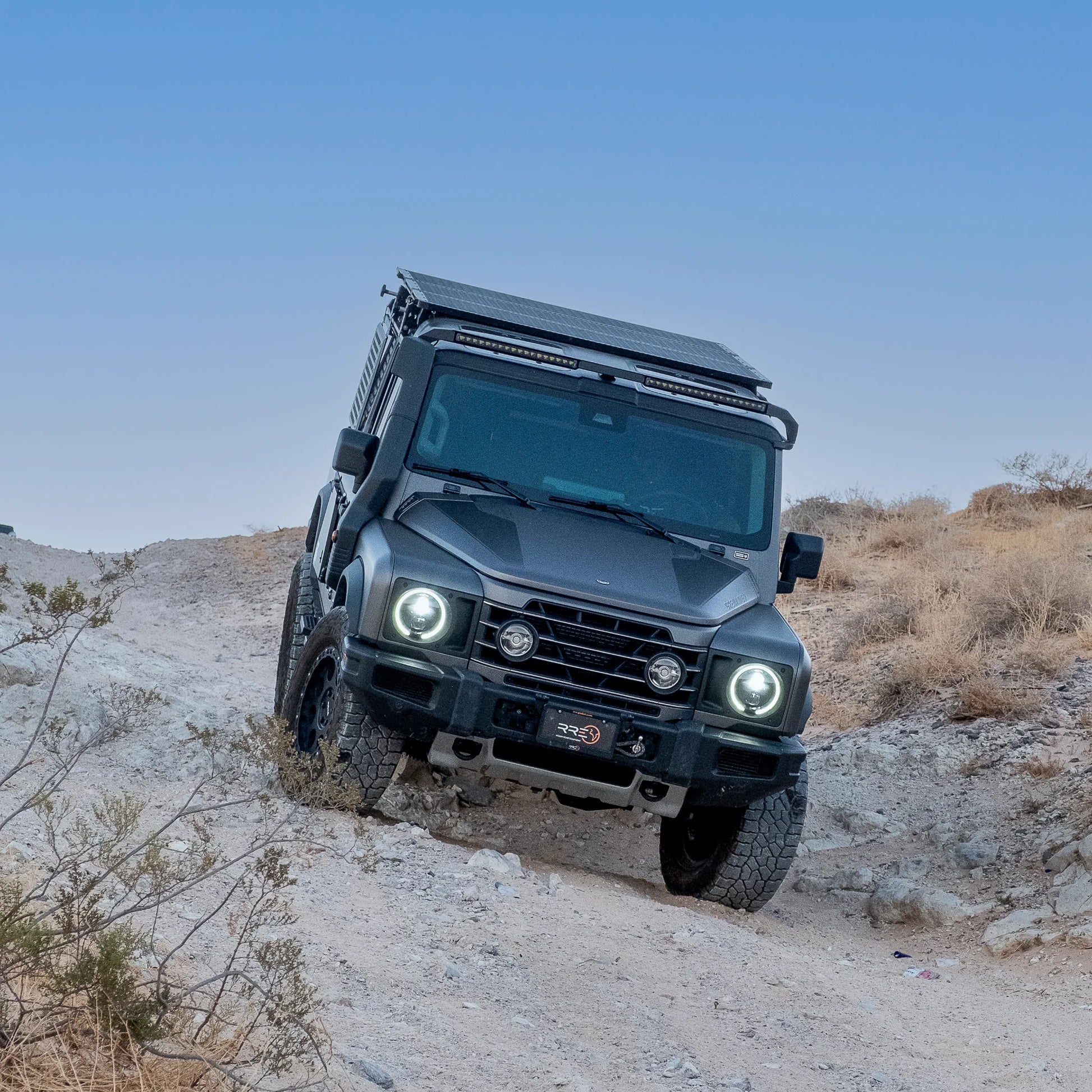 Reiger V5 4-way adjustable dampers and heavy-duty 1.6-inch lift coil springs for Ineos Grenadier suspension system upgrade.