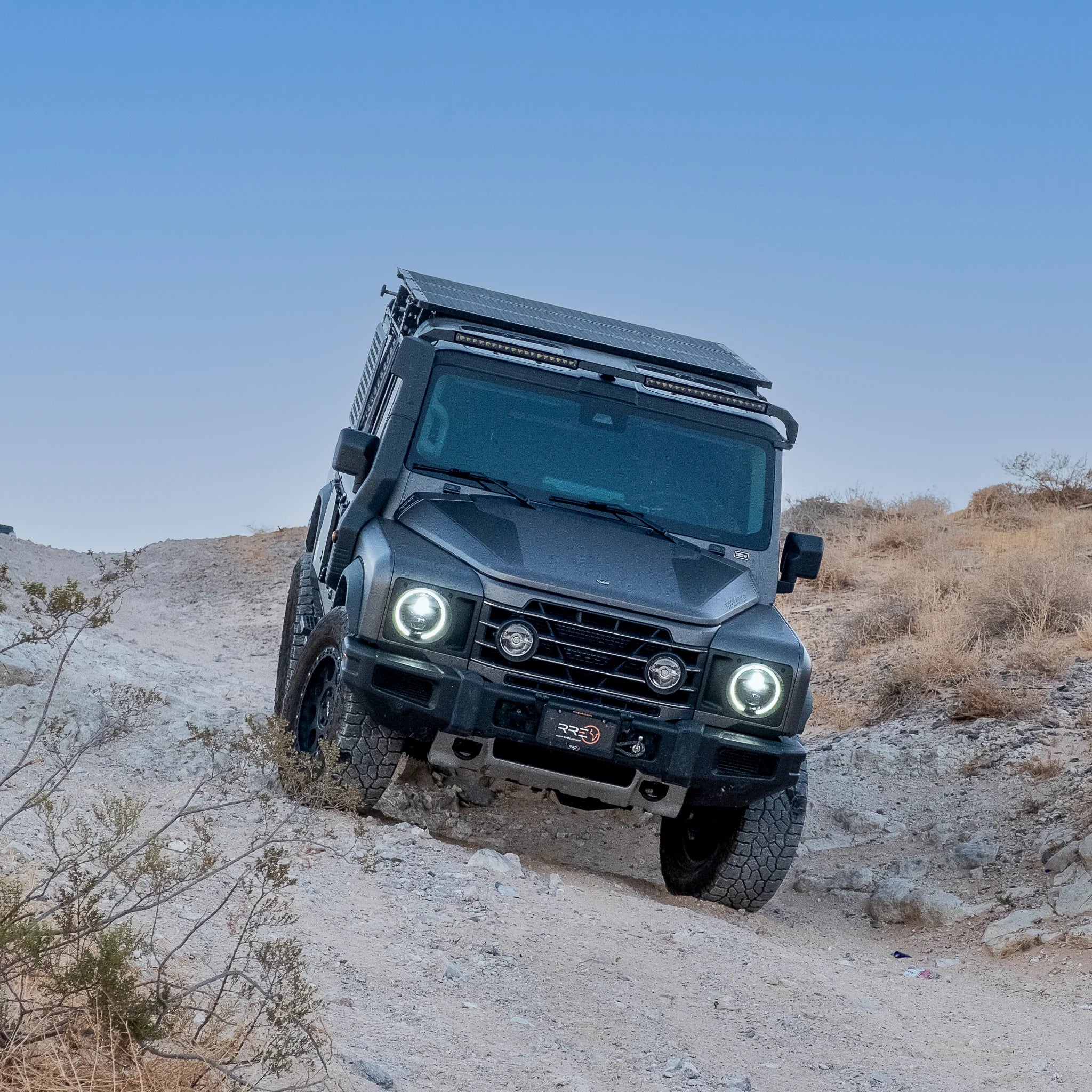 Reiger V5 4-way adjustable dampers and heavy-duty 1.6-inch lift coil springs for Ineos Grenadier suspension system upgrade.