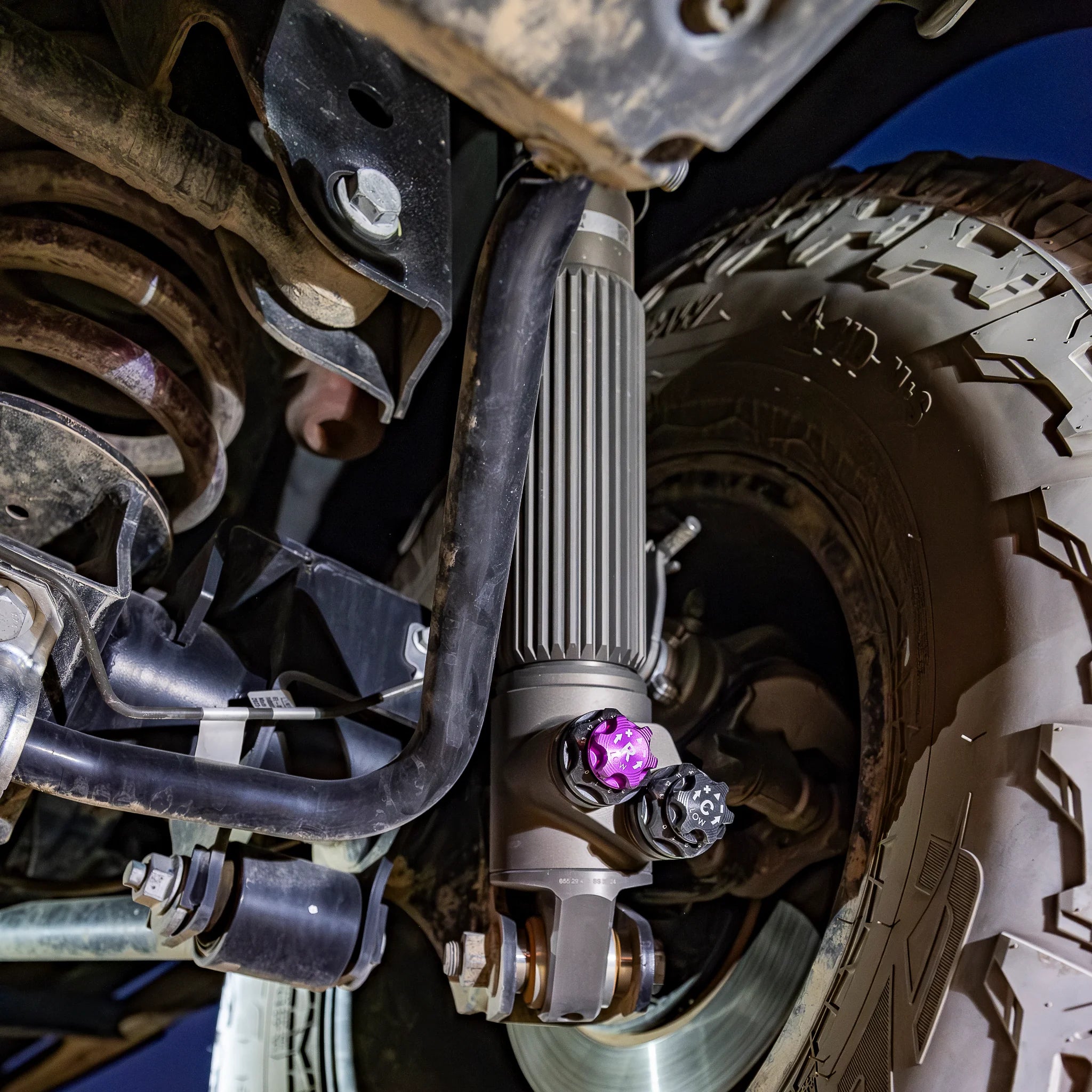 Reiger V5 4-way adjustable dampers and heavy-duty 1.6-inch lift coil springs for Ineos Grenadier suspension system upgrade.