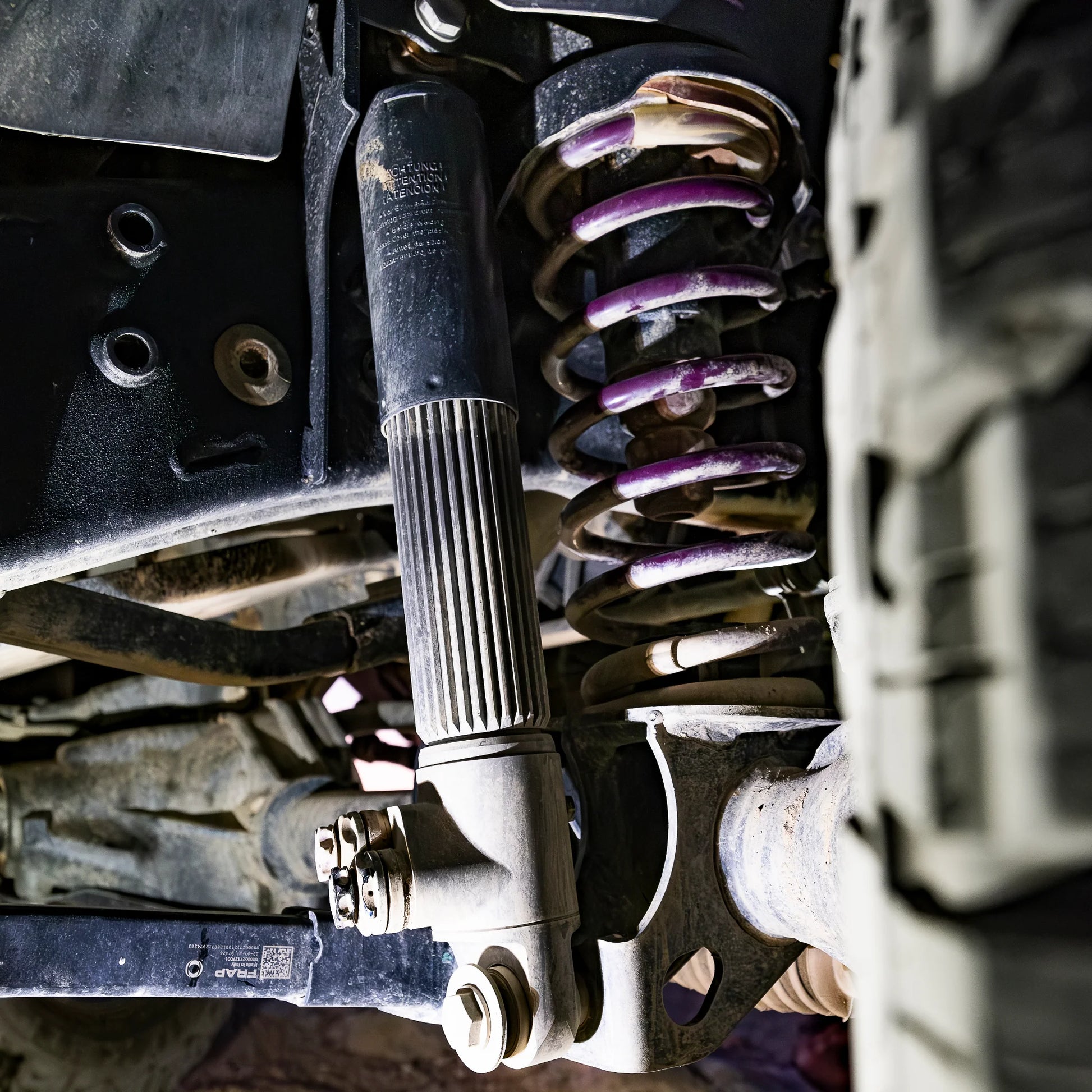 Reiger V5 4-way adjustable dampers and heavy-duty 1.6-inch lift coil springs for Ineos Grenadier suspension system upgrade.