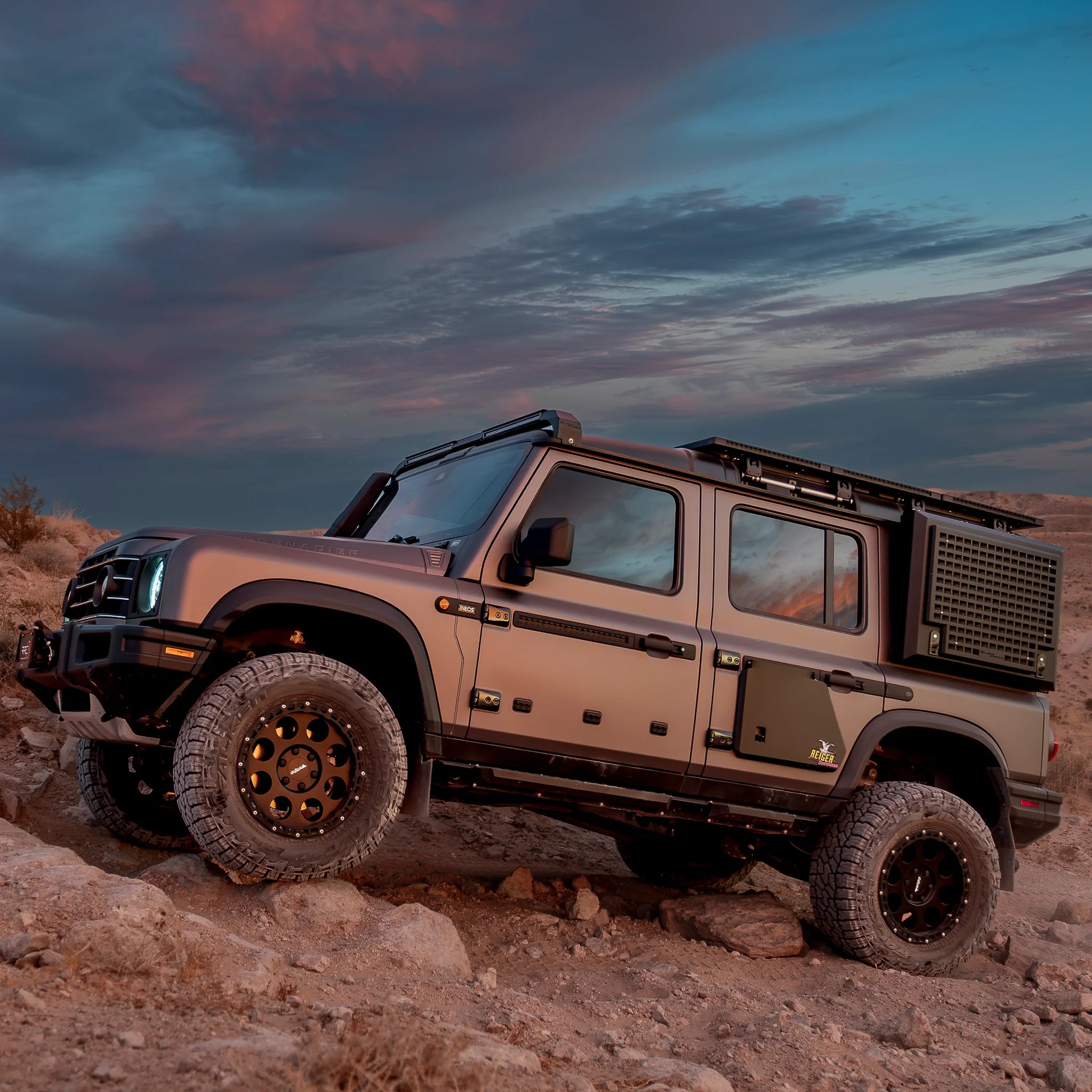 Reiger V5 4-way adjustable dampers and heavy-duty 1.6-inch lift coil springs for Ineos Grenadier suspension system upgrade.