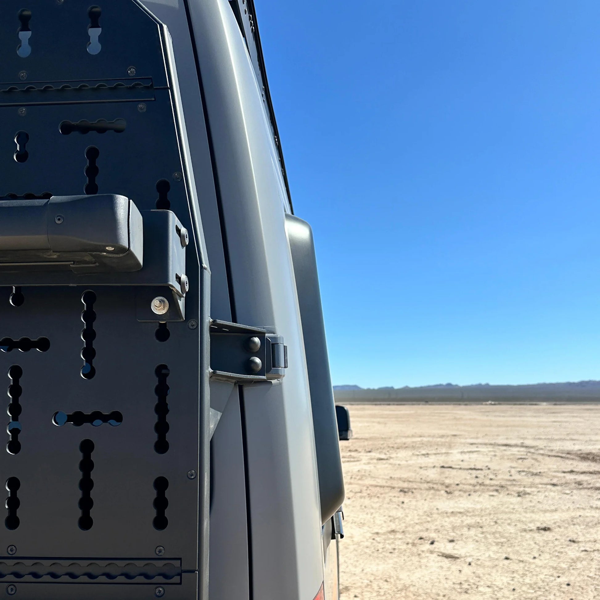 Fully insulated GRP window flares for a Mercedes Sprinter van, designed to create a 77-inch wide interior sleeping area.