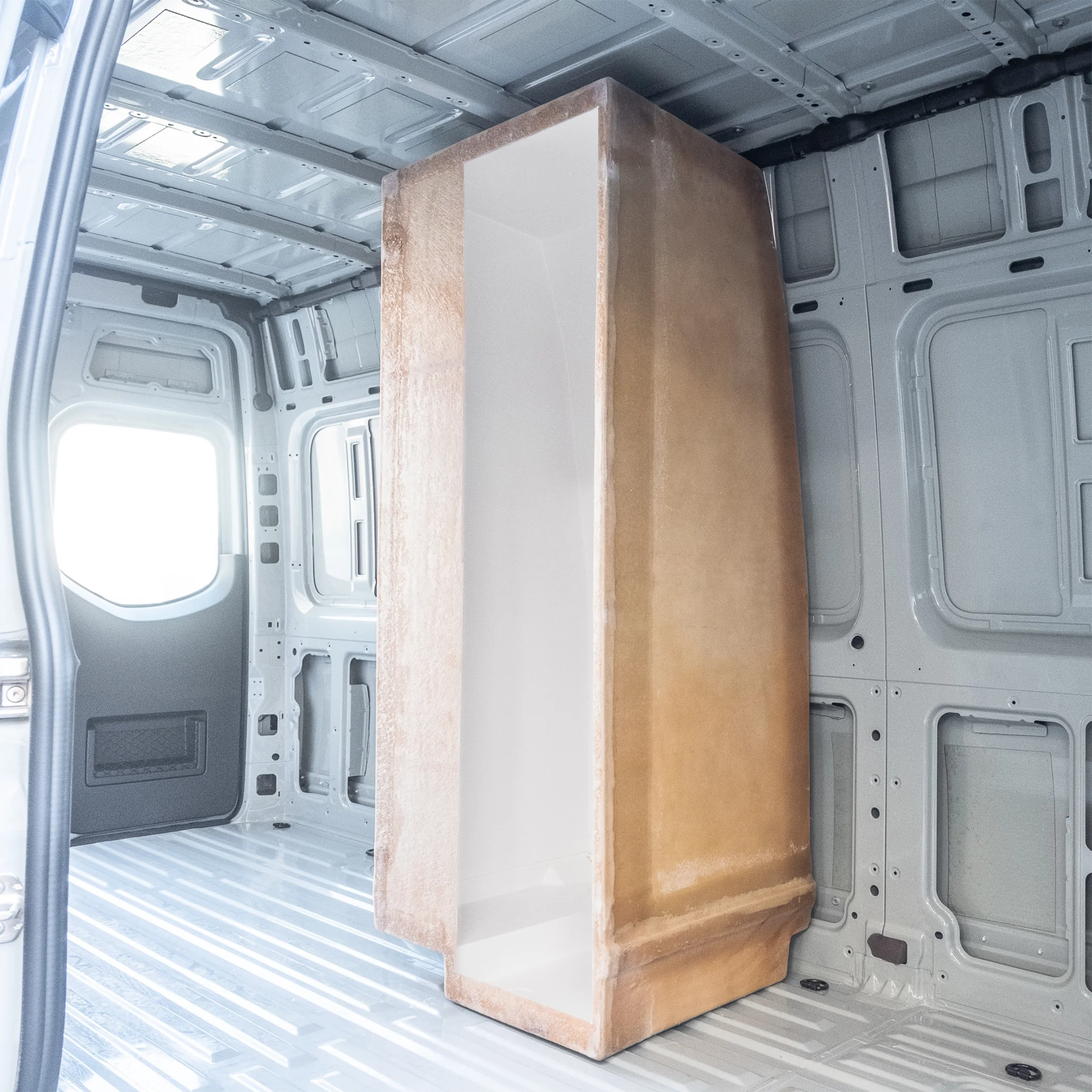 High-quality FRP camper van shower booth with a gel-coat finish, contoured to fit the interior wall of a Mercedes Sprinter or Ford Transit.