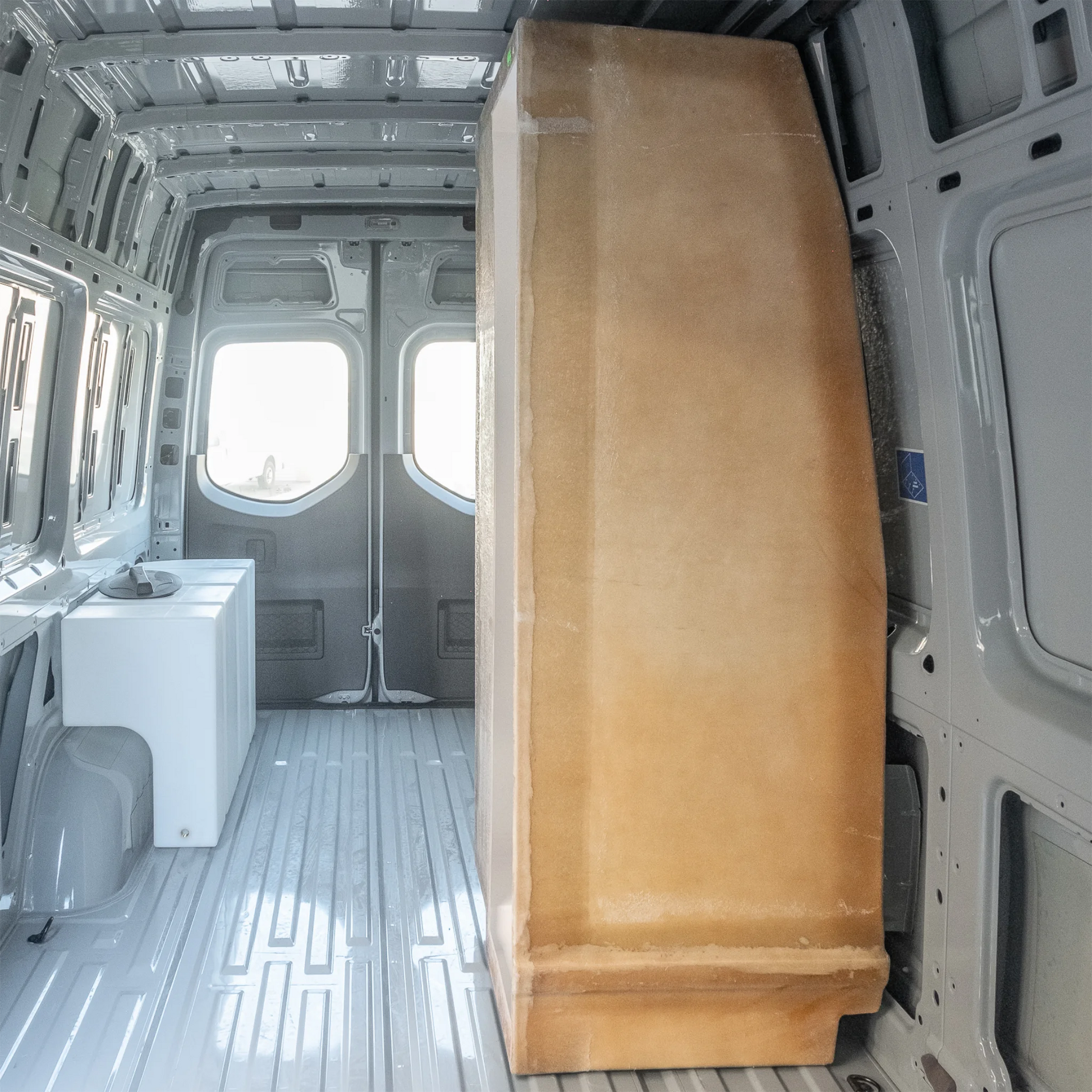 High-quality FRP camper van shower booth with a gel-coat finish, contoured to fit the interior wall of a Mercedes Sprinter or Ford Transit.