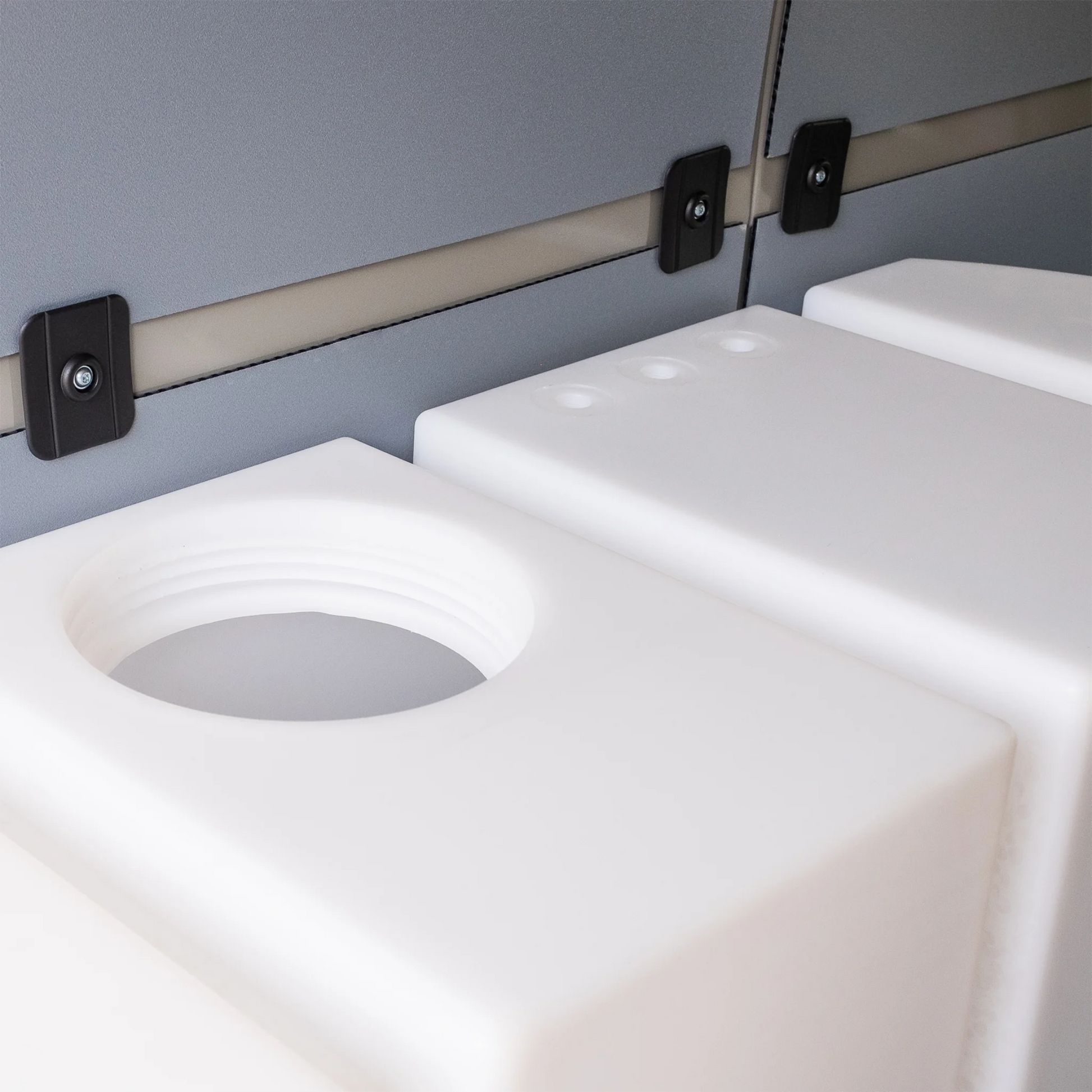 Heavy-duty 59.4 gallon poly wheel well fresh water tank with brass fittings, contoured for Mercedes Sprinter 144 and 170 wheelbase.