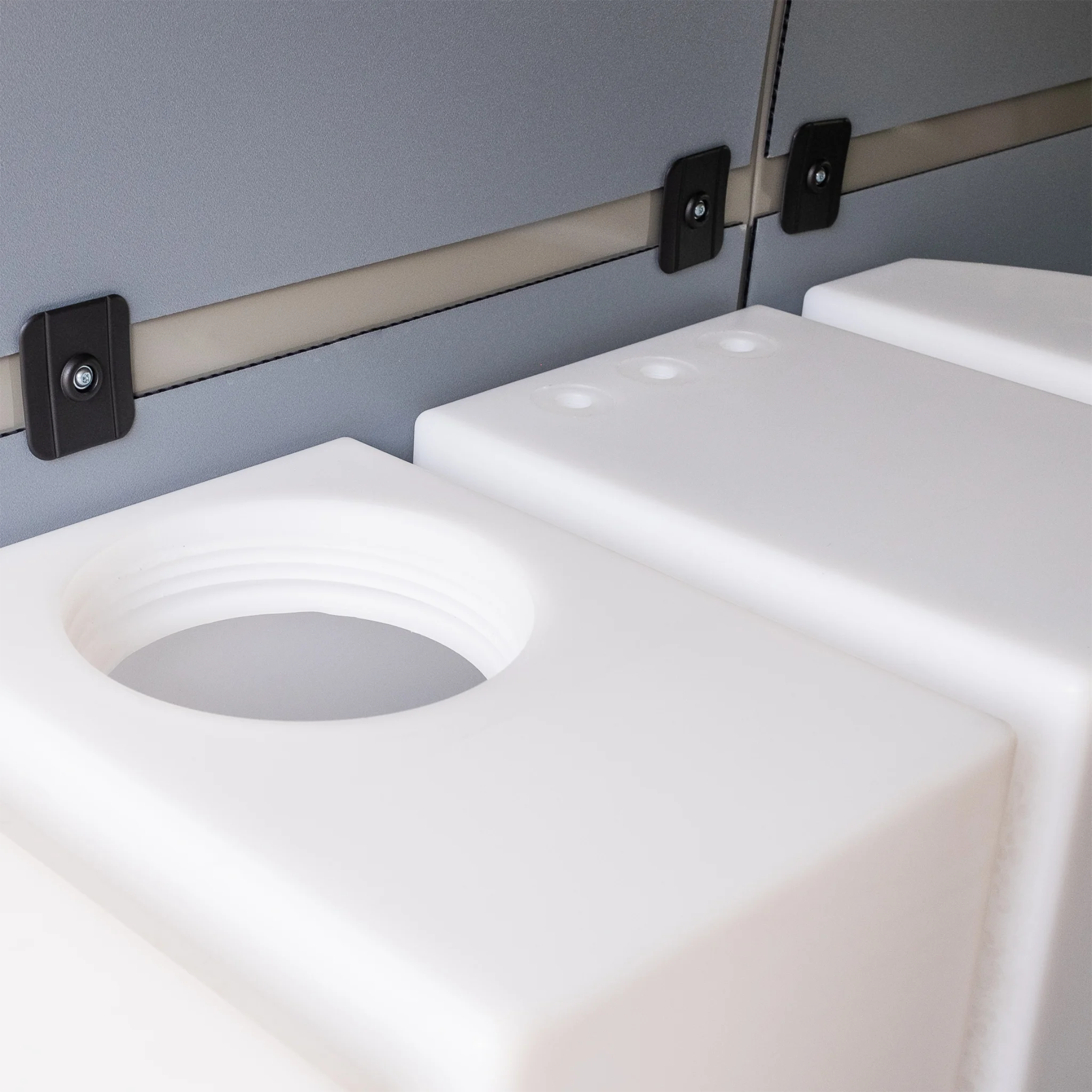 Heavy-duty 59.4 gallon poly wheel well fresh water tank with brass fittings, contoured for Mercedes Sprinter 144 and 170 wheelbase.