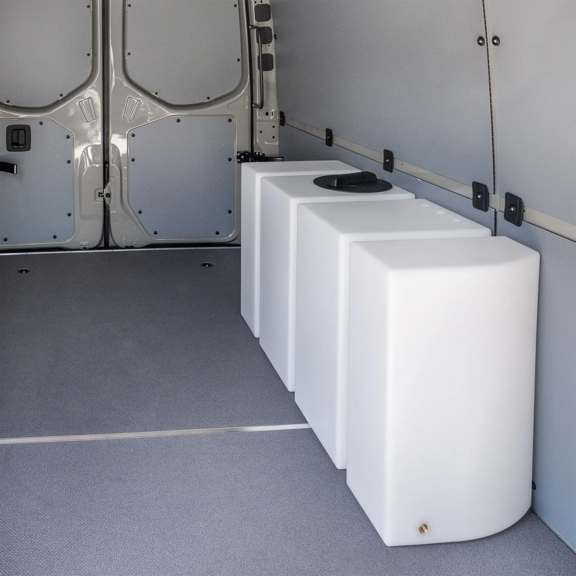 Heavy-duty 59.4 gallon poly wheel well fresh water tank with brass fittings, contoured for Mercedes Sprinter 144 and 170 wheelbase.