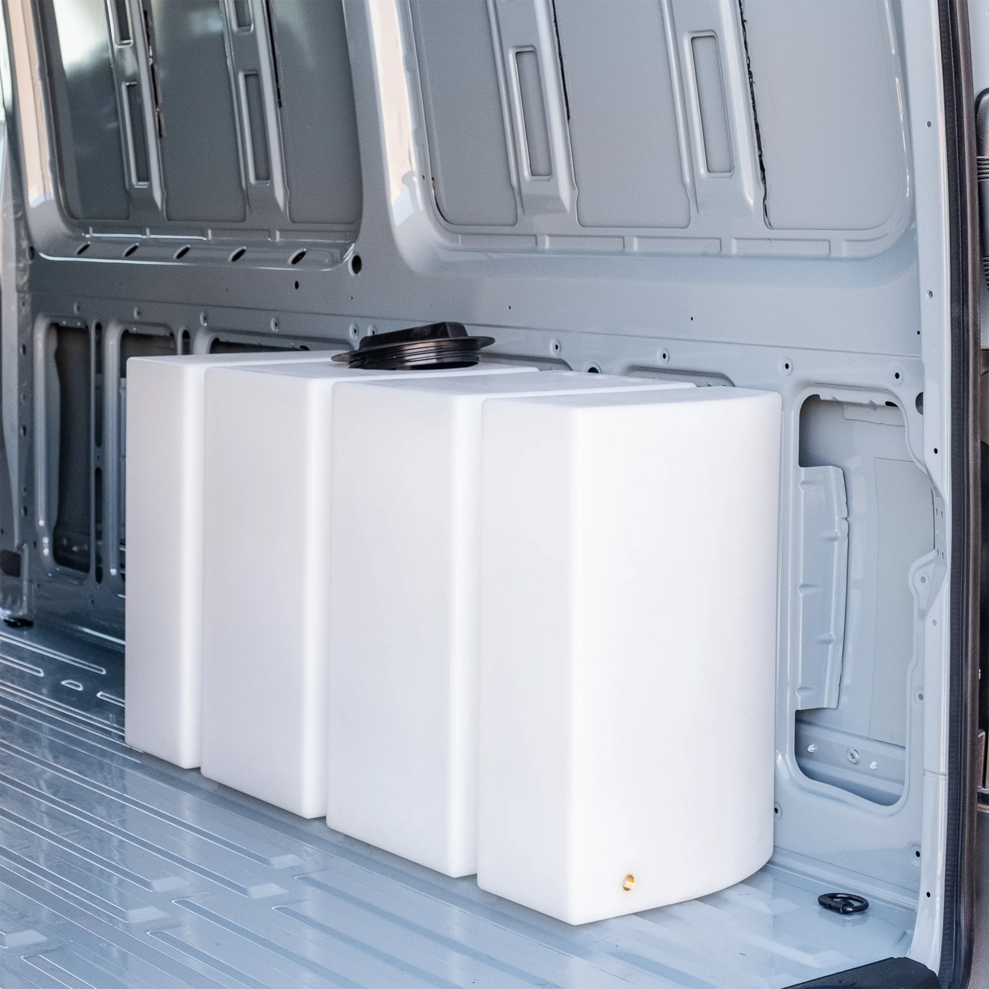 Heavy-duty 59.4 gallon poly wheel well fresh water tank with brass fittings, contoured for Mercedes Sprinter 144 and 170 wheelbase.