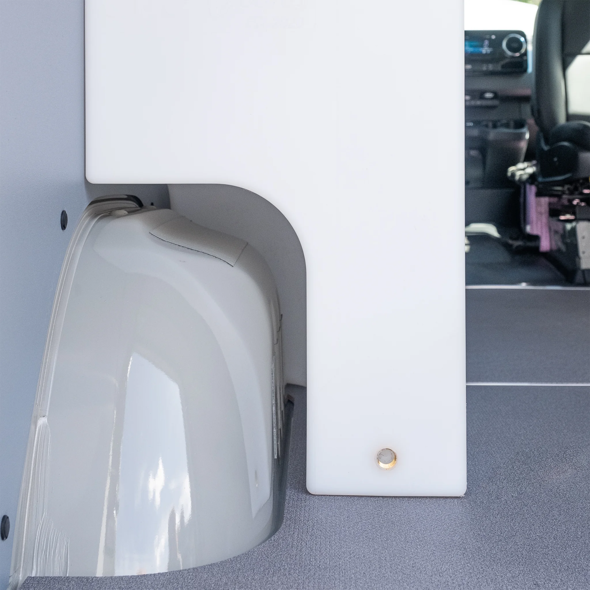 Heavy-duty 59.4 gallon poly wheel well fresh water tank with brass fittings, contoured for Mercedes Sprinter 144 and 170 wheelbase.