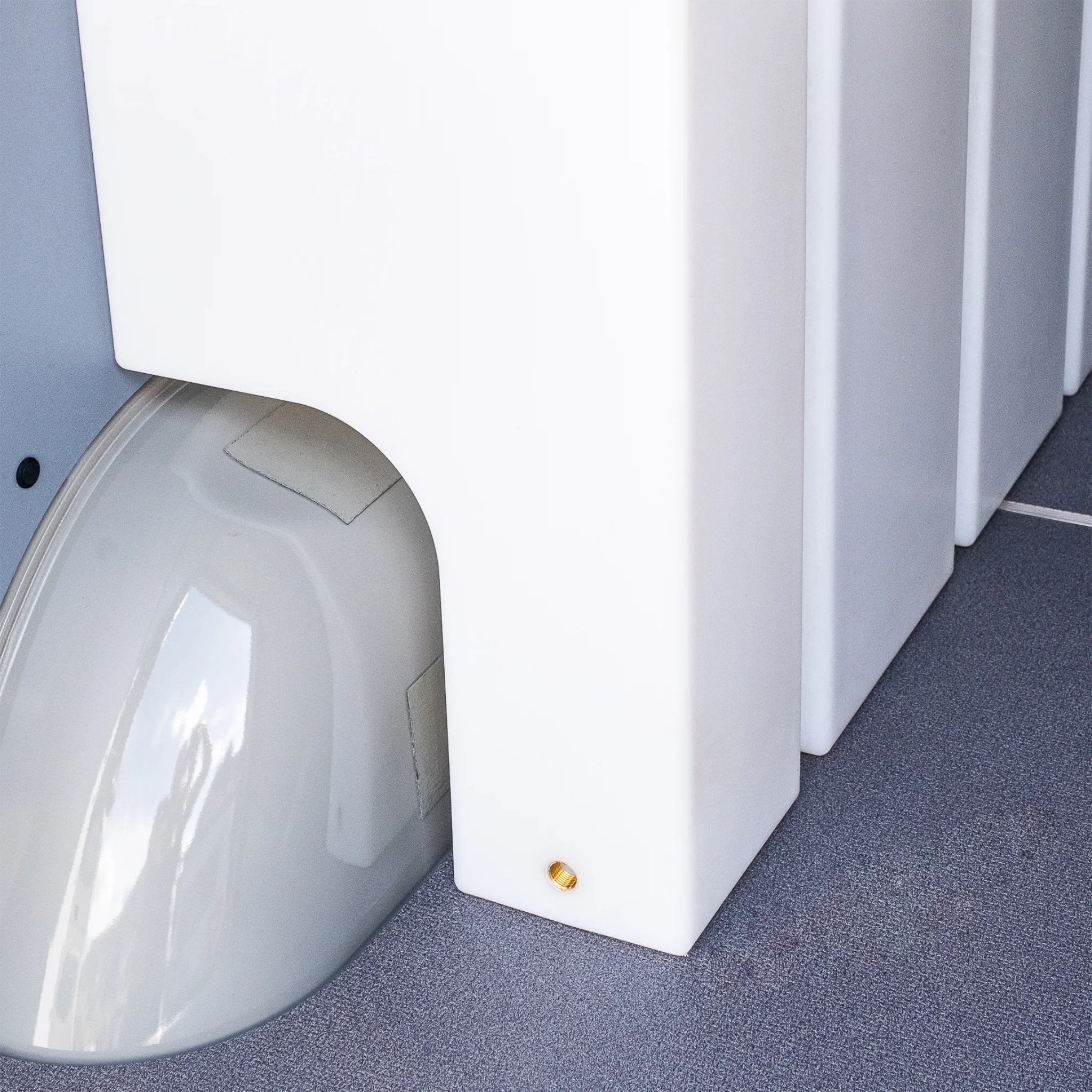 Heavy-duty 59.4 gallon poly wheel well fresh water tank with brass fittings, contoured for Mercedes Sprinter 144 and 170 wheelbase.