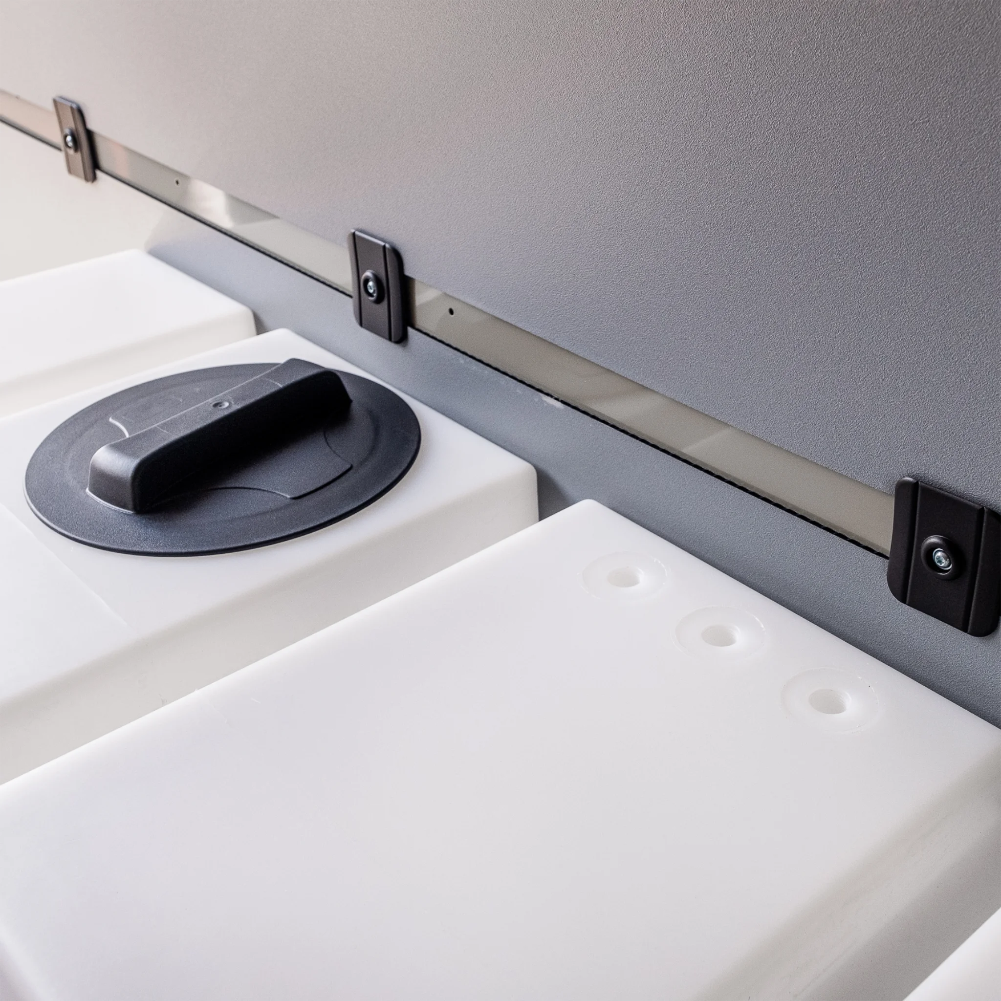 Heavy-duty 59.4 gallon poly wheel well fresh water tank with brass fittings, contoured for Mercedes Sprinter 144 and 170 wheelbase.