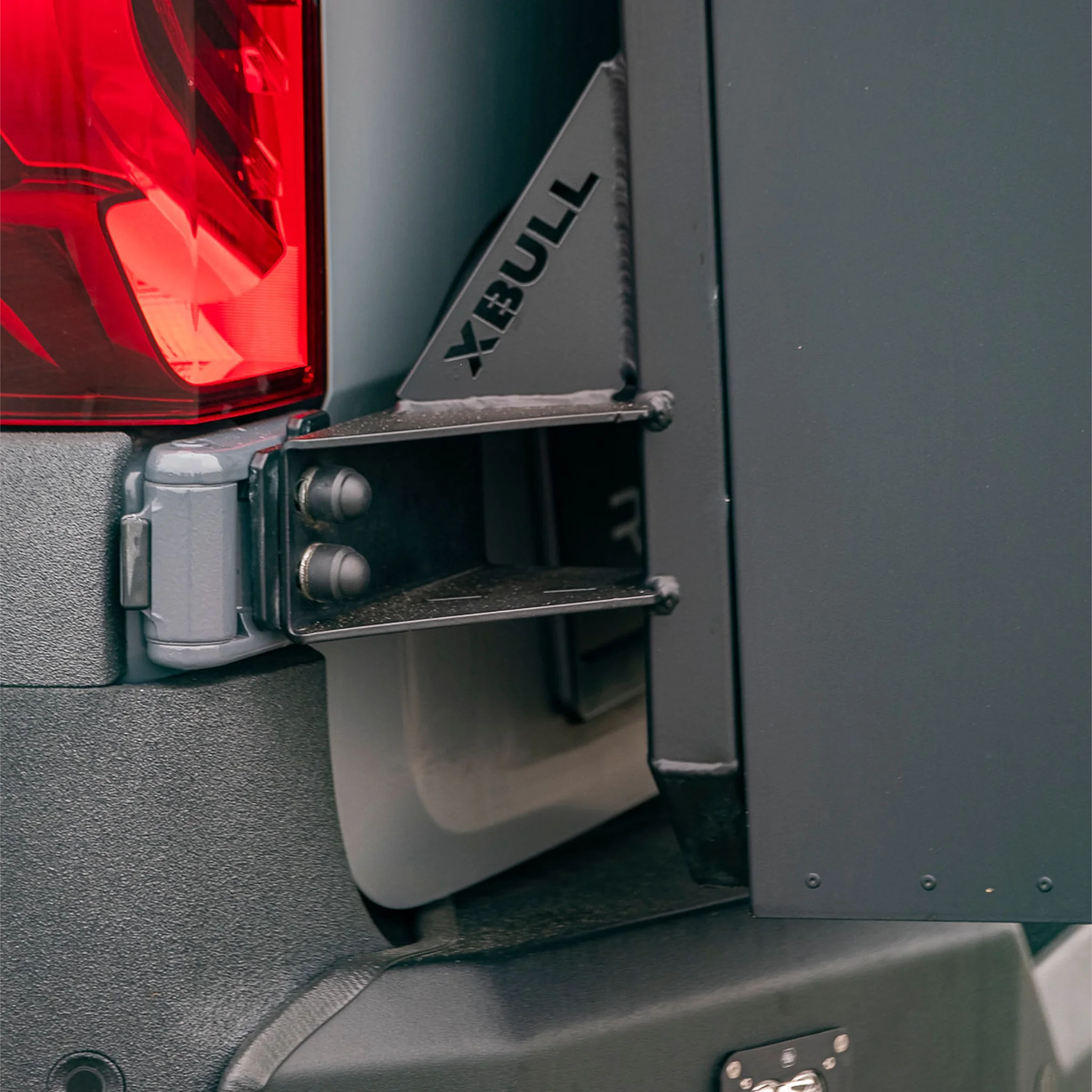 X-Bull aluminum cargo carrier mounted to a Sprinter rear door